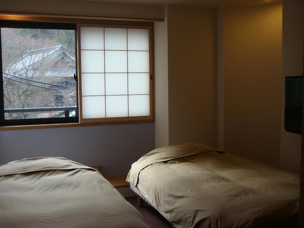 Mizuhasou Hotel Hatsukaichi Quarto foto